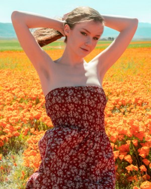 Emily Bloom Posing With Poppies 1